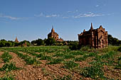 The cluster of red brick temples, named Khay-min-gha on the map on the North plain of Bagan. Myanmar. 